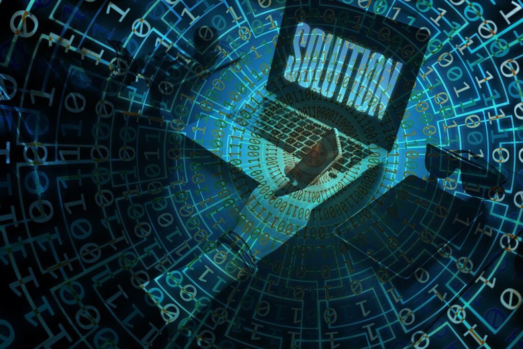 Laptop displaying the word 'SOLUTION' with binary code in the background, representing digital IT solutions for small and medium enterprises